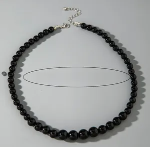 Detail of black beaded necklace with silver lobster clasp and size specifications