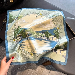 Close-up of lightweight mulberry silk square scarf with traditional landscape print