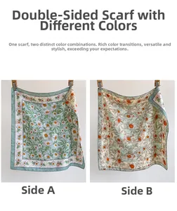 Détail d'un foulard carré en soie à double face avec motifs de marguerites et fleurs