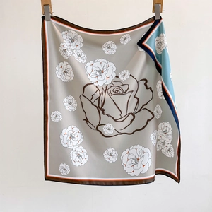 Elegant grey twill silk scarf with tea flower print and multicolored contrast borders