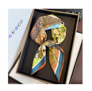 Macro detail of square silk scarf with Van Gogh sunflower oil painting pattern
