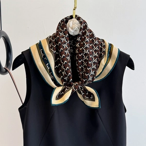 Elegant geometric silk wool scarf with blue borders tied on a black dress, 62cm size