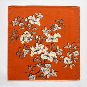 Elegant orange silk wool scarf with vintage floral magnolia print on white background