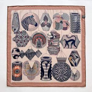 Artistic silk-wool square scarf with diverse animal lantern patterns on a pink background