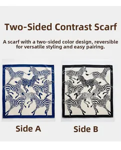 Detail of zebra pattern silk wool scarf showing the double-sided contrast color edges