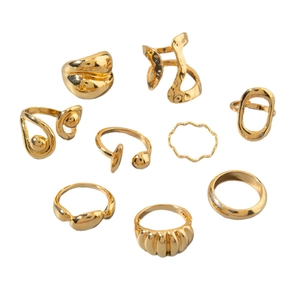 9-piece set of gold geometric rings with irregular open designs and polished liquid finish