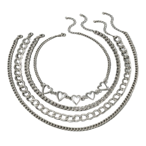 Silver multilayer hip hop necklace featuring heart pendants and assorted chunky Cuban chains