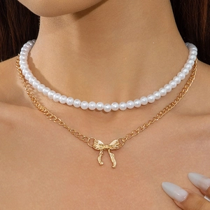 Collier De Künstliche Perles Double Couche Avec Pendentif Nœud En Alliage Bijoux De Mode Empilables Pour Femmes Style Vintage