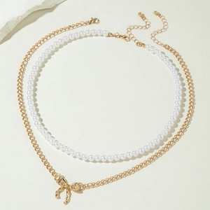 Ensemble de colliers double rang à perles et chaîne dorée avec pendentif nœud élégant