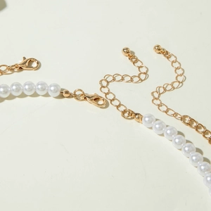 Collier de perles à double rangée avec fermoir doré et chaîne d'extension