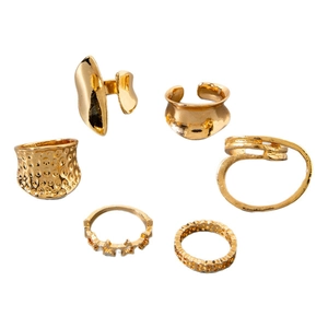 Set of 6 gold alloy irregular rings with hammered textures and hollow geometric designs
