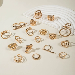 16-piece gold geometric ring set featuring minimalist, spiral, and hollow designs