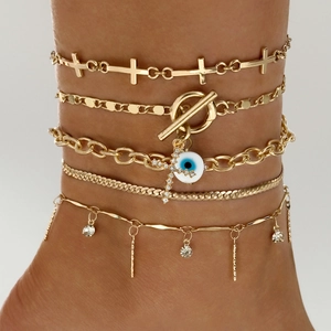 Gold-layered anklet set with cross, evil eye pendant, and OT buckle snake chain