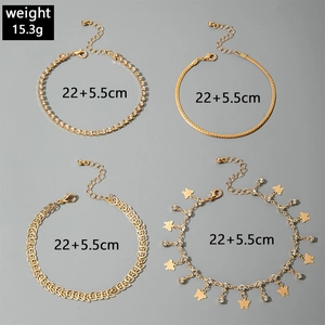 Detailed view of 4-piece gold anklet set with butterfly pendant and size measurements