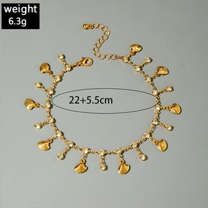 Detail view of gold anklet with shell charms and crystals showing length 22+5.5cm