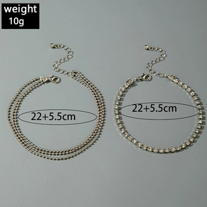 Detail view of silver layered bead chain and crystal tennis anklet with 10g weight and size