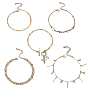 Five-piece gold layered anklet set with cross charms, evil eye pendant and OT buckle