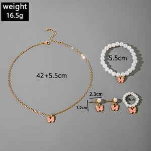 Détails du coffret bijoux papillon rose avec perles et dimensions des accessoires