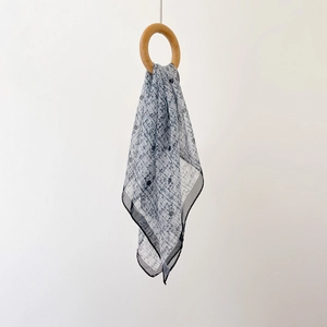 Lightweight grey-white silk chiffon square scarf with blue grid pattern and wood ring