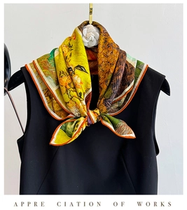 Detail of silk wool scarf featuring Monet sunflower oil painting print and rolled edges