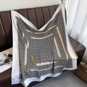 Elegant silk-like square scarf with black white meander pattern and gold chain print