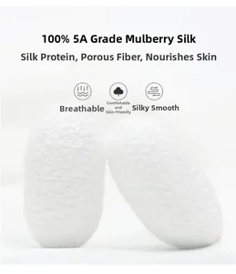 Macro shot of 100% 5A grade natural white mulberry silk cocoons for premium scarves