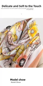 Close-up of floral print oversized silk scarf showing soft fabric texture and drape