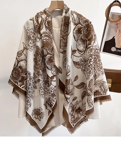 Detail of floral printed cotton linen shawl with fine fringes and retro flower patterns