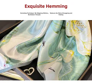 Detail of the overlock edge on a 100% silk lotus print scarf with fine stitching