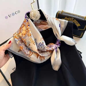 Elegant 100% mulberry silk square scarf featuring vibrant floral prints on a cream base