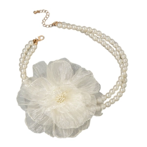 French vintage double-layered pearl necklace featuring a large white tulle floral accent