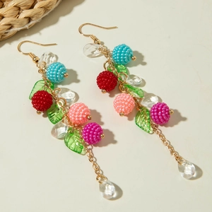 Long berry tassel drop earrings with colorful beads and gold hooks in a garden style