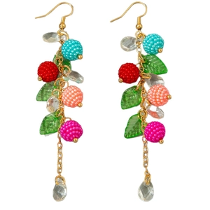 Colorful beaded tassel earrings with floral resin leaves and crystal pendants on white background