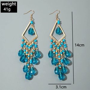 Detailed view showing blue glass bead tassels and teardrop pendants with 14cm length