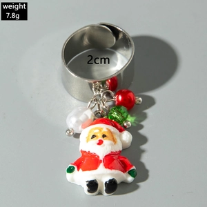 Detail showing Christmas Santa resin pendant and pearls on adjustable silver ring