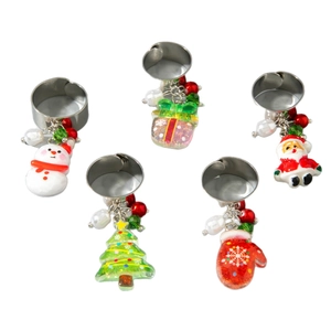 Five-piece Christmas resin pendant wine glass charms set with festive snowman and tree designs