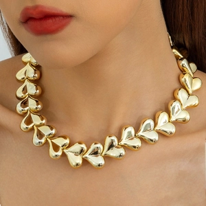 Polished gold heart link choker necklace for women with chunky 3D heart-shaped metal links