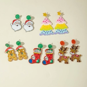 Détail lot de 5 paires de boucles d'oreilles Noël en acrylique avec Père Noël et sapins