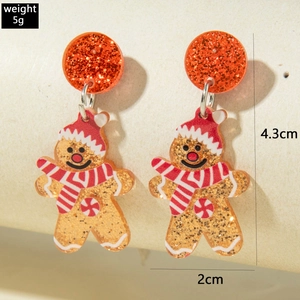 Détails des boucles d'oreilles bonhomme de pain d'épice avec dimensions et poids de 5g