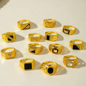 Set of 12 gold plated rings with black enamel and rhinestones in Middle Eastern style