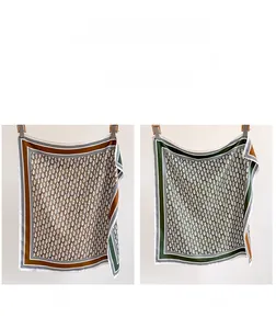 Double-sided square silk scarf with vintage chain patterns in brown and green colors