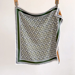 Classic chain pattern silk square scarf in dark green and cream with a wide border