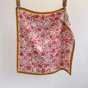 Elegant square silk scarf with red and pink floral prints and yellow border