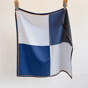 Polka dot silk scarf in navy and blue with orange borders for elegant women