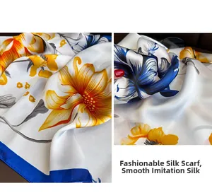 Détail d'un foulard en satin de soie avec imprimés floraux et drapé soyeux brillant