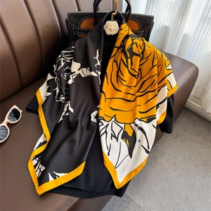 Vintage printed silk square scarf featuring bold orange roses and black abstract patterns