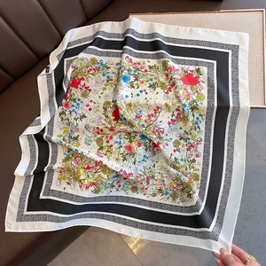 Floral print silk scarf with classic botanical patterns and geometric borders