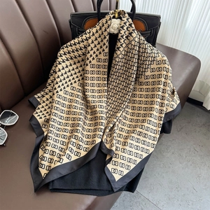 Classic houndstooth and geometric print 90cm silk scarf in golden brown and black tones