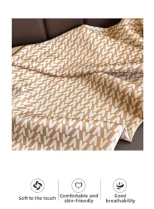 Close-up of soft breathable square scarf with vintage geometric V pattern print