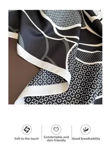 Detail of soft breathable silk-like scarf featuring geometric patterns and rolled edges